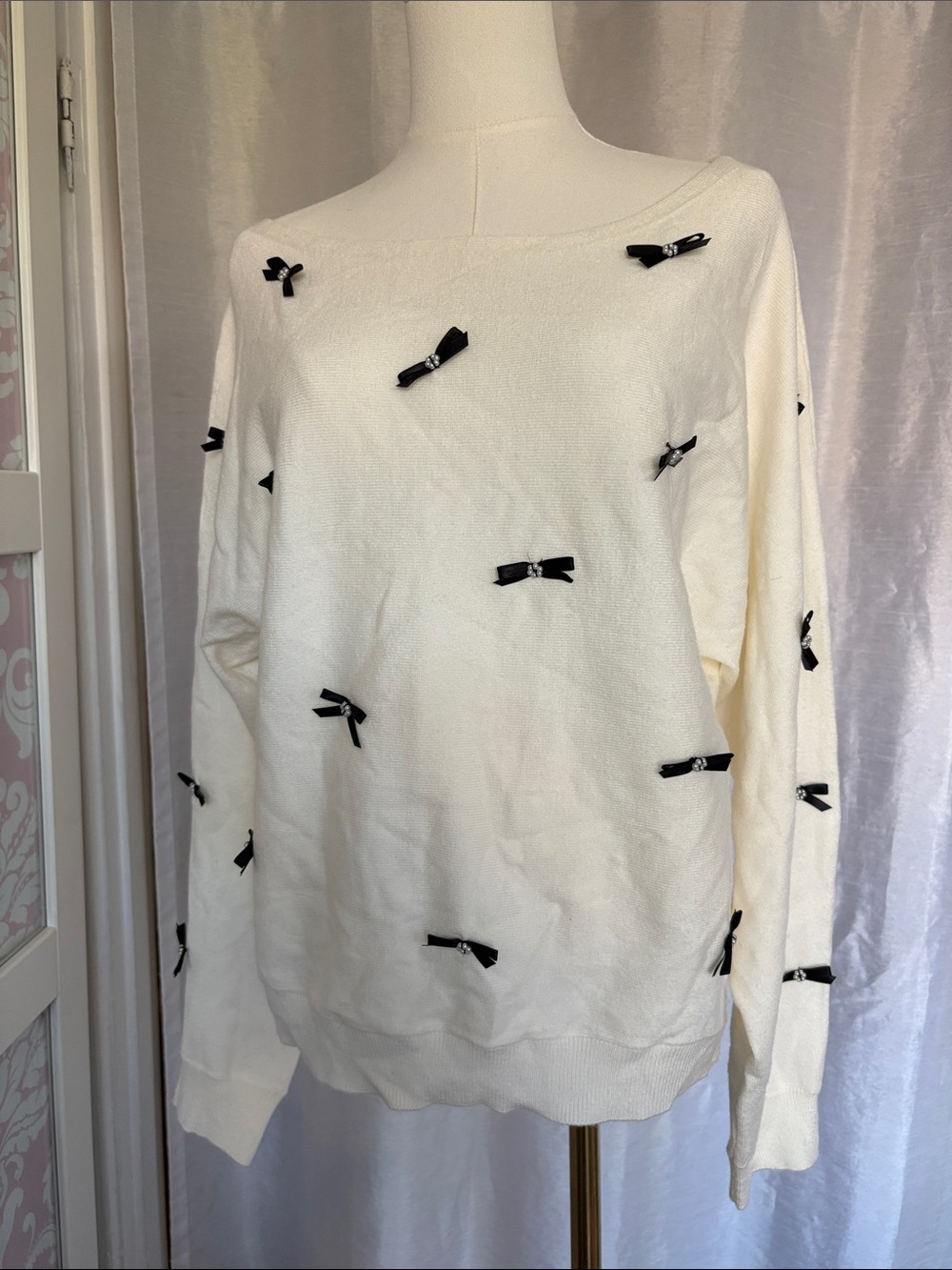Cream Off-the-Shoulder Bow-Appliqué Sweater